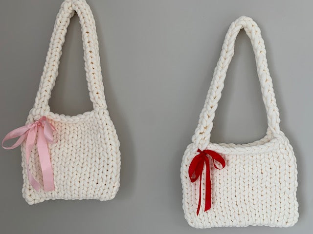 Handmade chunky knit bag with red bow